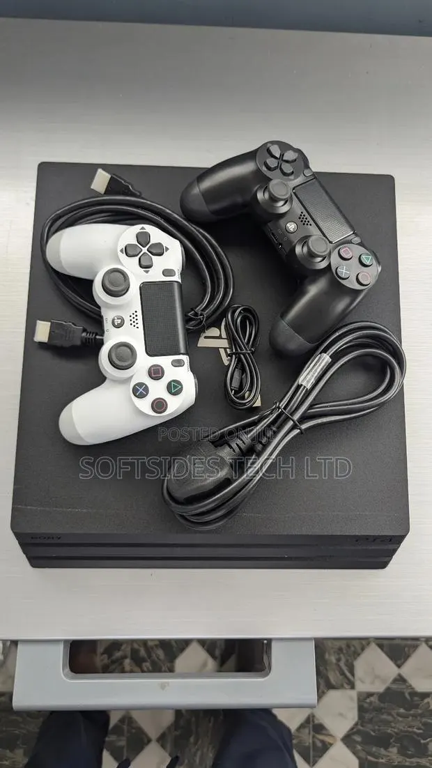 The Best Playstation Ps4 Pro With 2 Pads and 17 Games Installed Ready · Photo 1