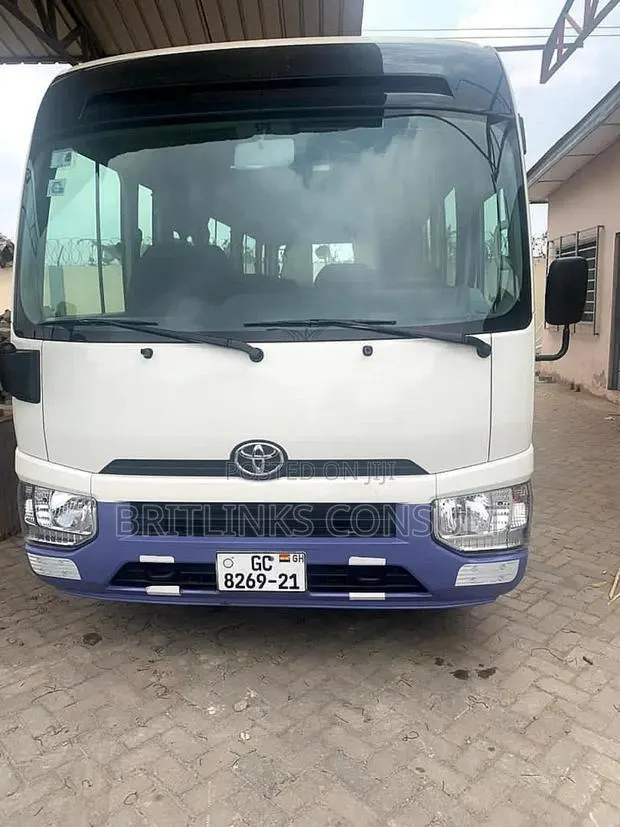 Rent a Bus Now Toyota Coaster Bus 30 Seater! · Photo 1
