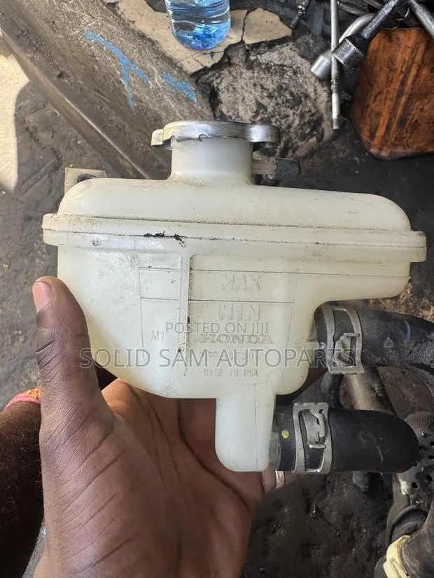 Honda Engine Coolant Overflow Reservoir Tank · Photo 1