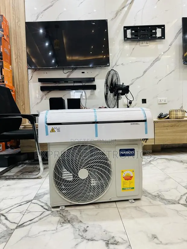 Ultra Modern White ——1.5hp” Dual Inverter Air Conditioner Nasco · Photo 1