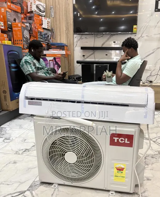 Ultra Cooling TCL 1.5hp Air Conditioner(White)Remote Control · Photo 1