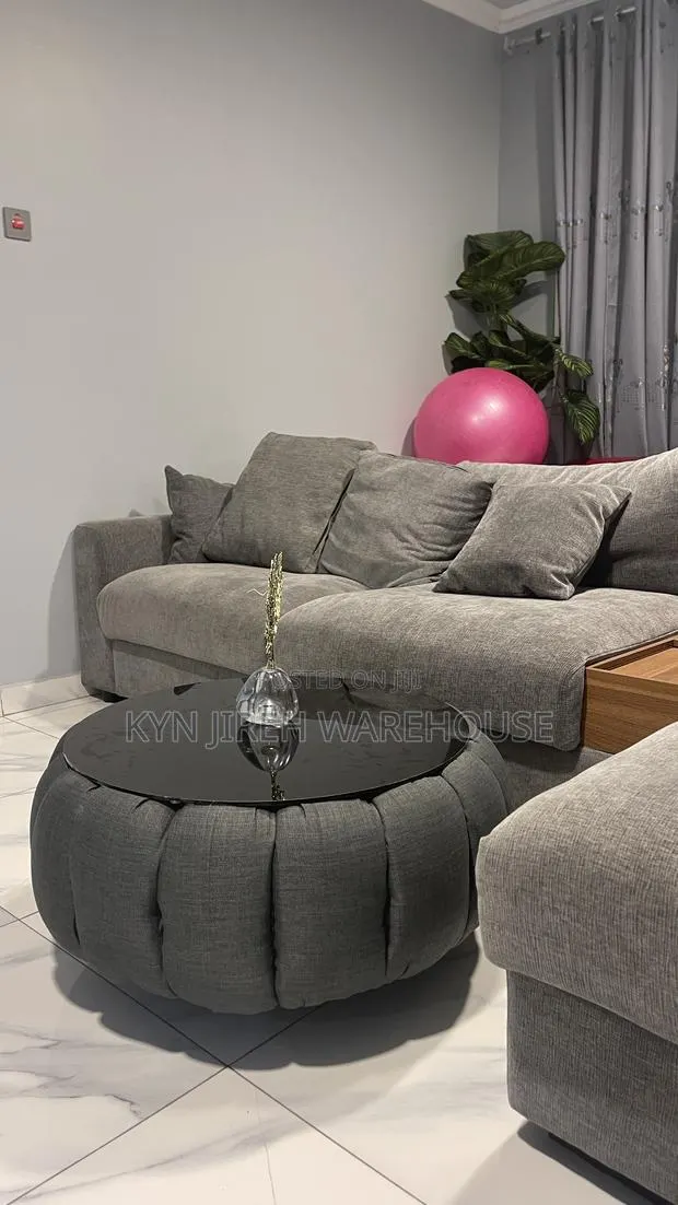 Grey Material Ottoman Center Table · Photo 1