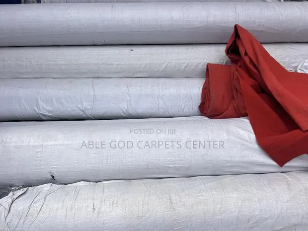 Full Roll and Bundle of Thick Woolen Carpets · Photo 1