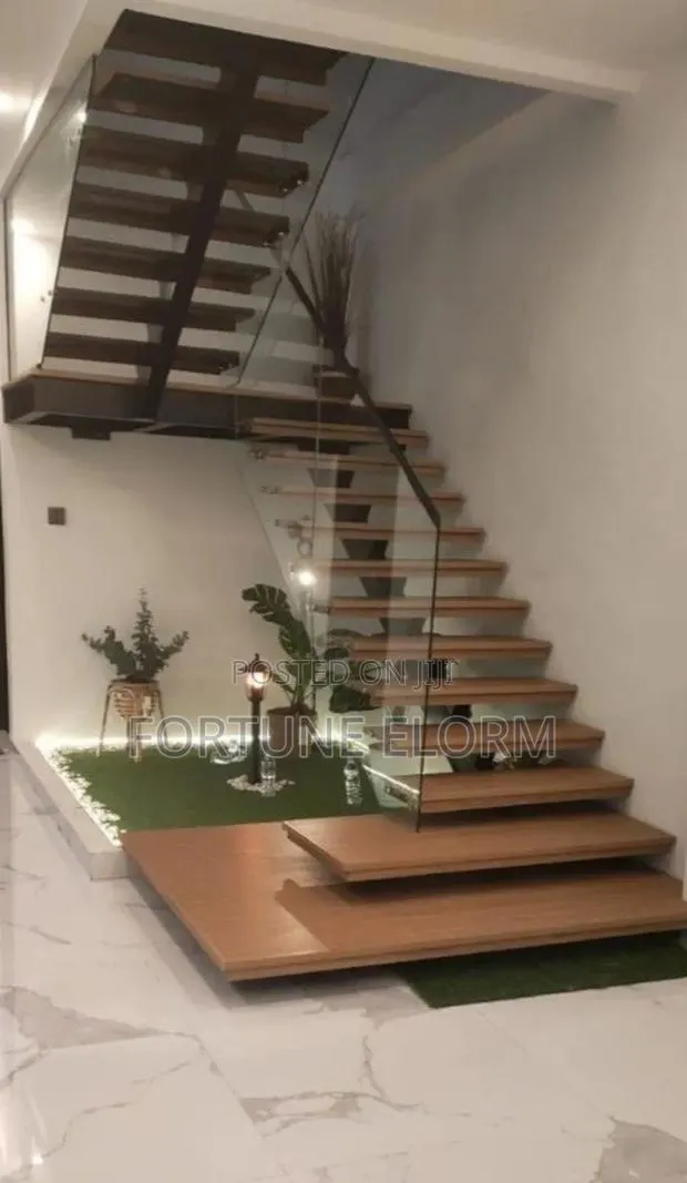 Elegant Metal and Wood Stairs · Photo 1