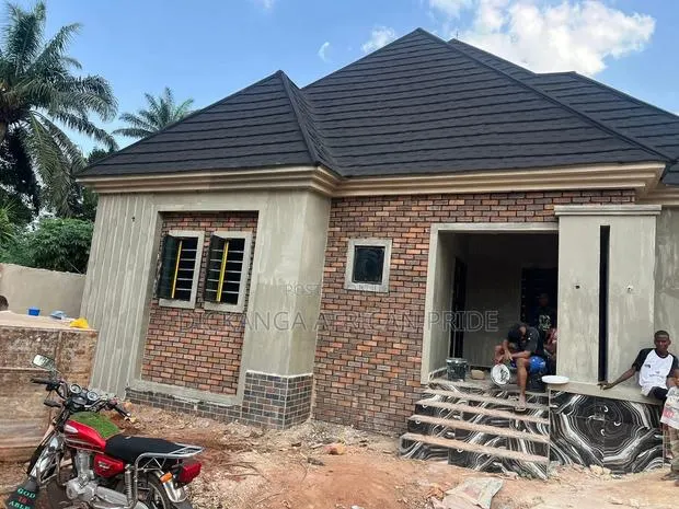 Modern Roofing Excellence by Dickanga Roofing Design · Photo 1
