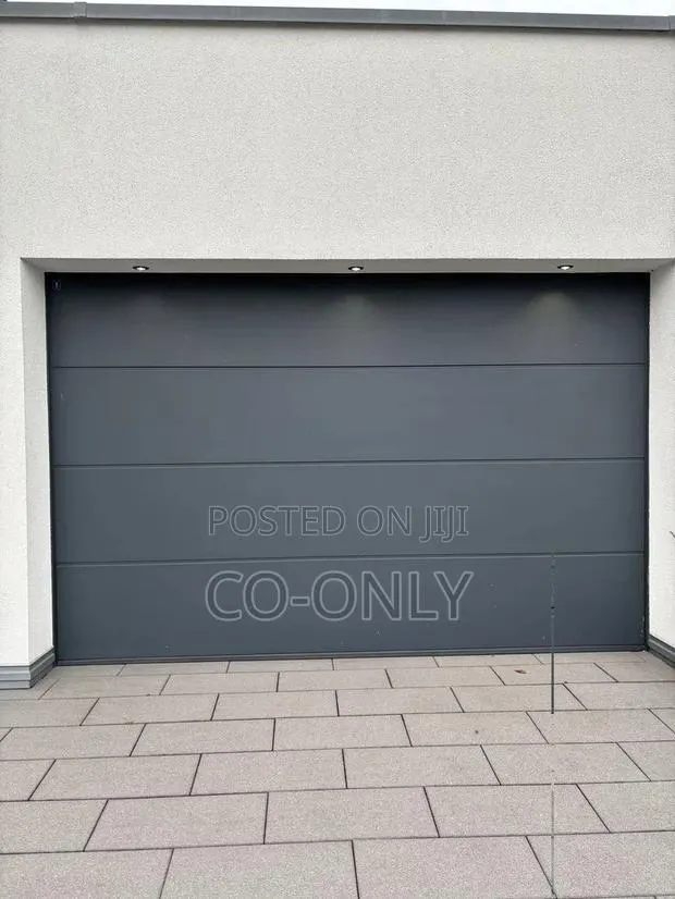 Canadian Automated Garage Doors, and Security Doors · Photo 1