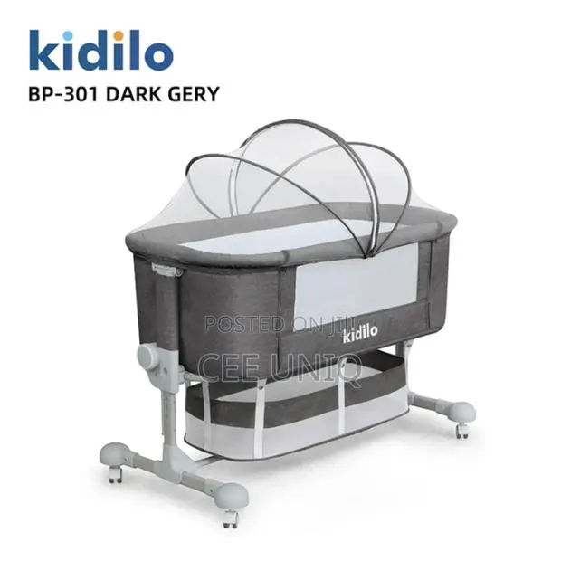 Fantastic Adjustable Bedside Cot · Photo 1