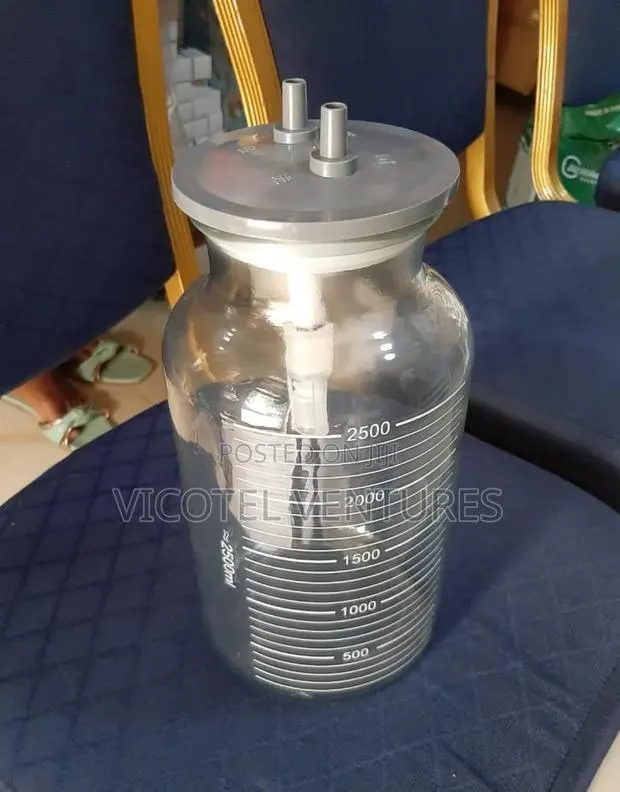 Suction Machine Bottle · Photo 1