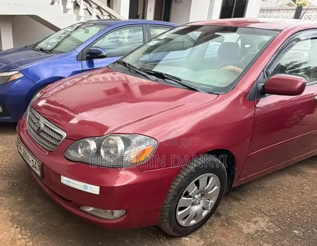 Toyota Corolla 2006 Red · Photo 1