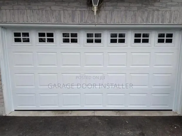 Garage Doors With Fanlight · Photo 1
