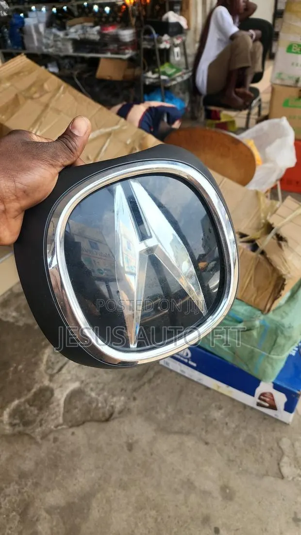 2019-2025 Acura RDX Front Grille Emblem (71170-TJB-A00) · Photo 1