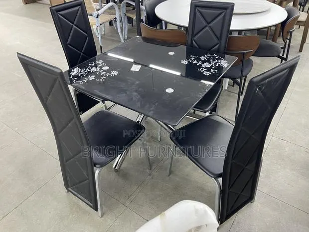 Durable 4 Seater Glass Dining Set · Photo 1