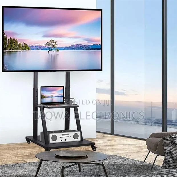 Typically-universal Mobile Tv Stand 32-75”” Inch · Photo 1