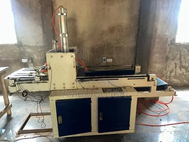 Automatic Plastic Bag Handle-Punching Stacking Machine — Tamale
