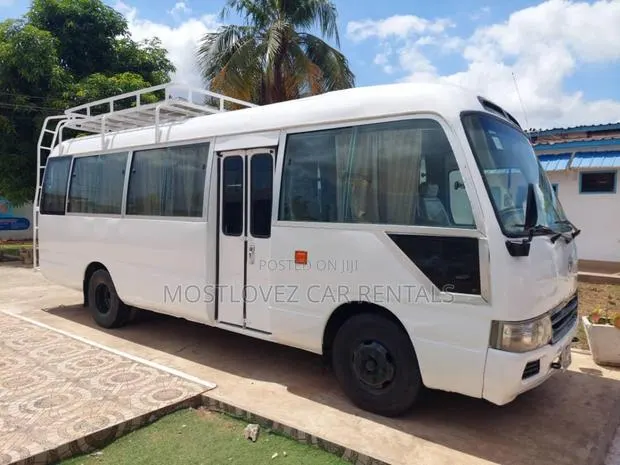 Car Rentals - 29 Seats Bus for Rent- Coasters Bus · Photo 1