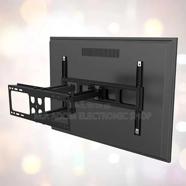 Easy to Install Adjustable Tv Mount 32”-55” · Photo 1