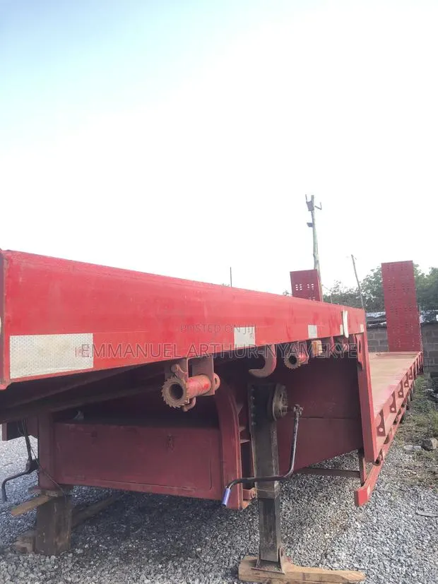 Heavy-Duty 4-Axle Low Bed Trailer for Sale · Photo 1
