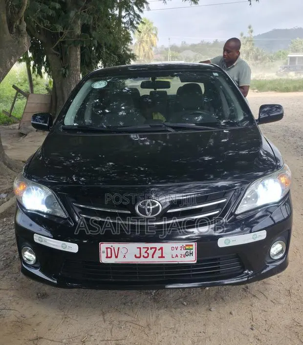 Toyota Corolla L 4dr Sedan (1.8L 4cyl 5M) 2012 Black · Photo 1