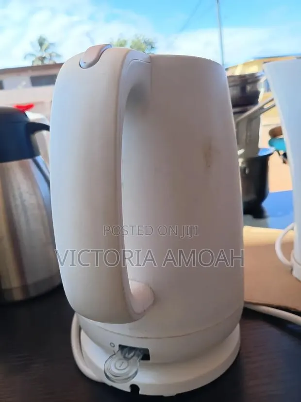 A White Electric Kettle. · Photo 1