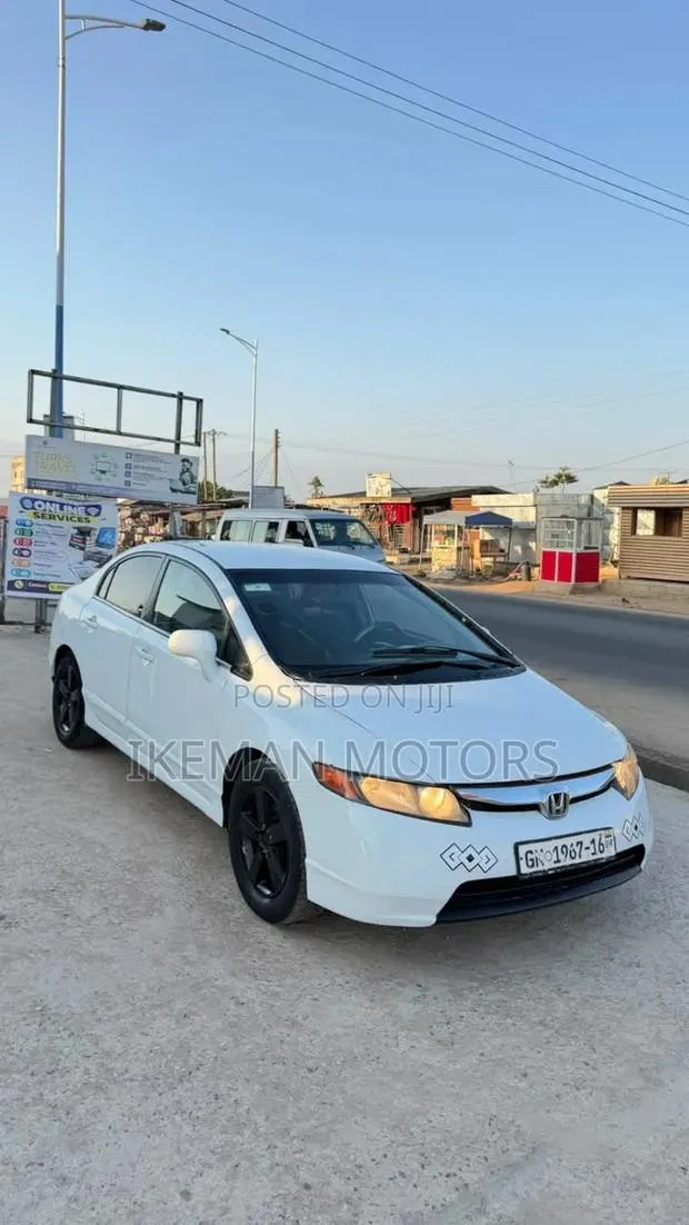 Honda Civic DX Sedan 2010 White · Photo 1