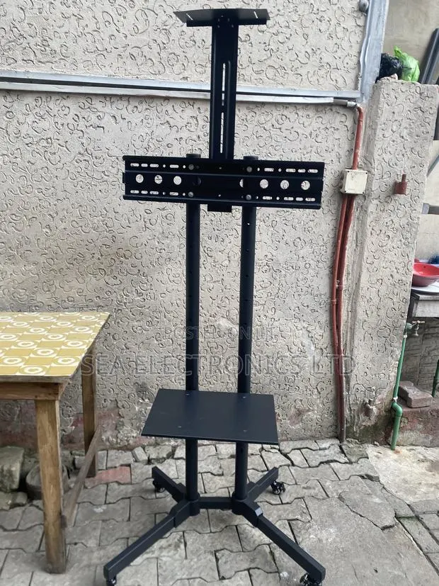 Shop Your TV Stand 32-70” · Photo 1