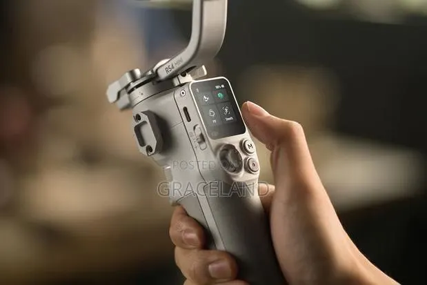 This Is Original Dji Rs 4 Mini Gimbal Creator Combo Camera · Photo 1