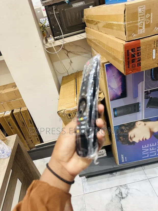 Available Now at Store Magic Remote Control MR-21. · Photo 1