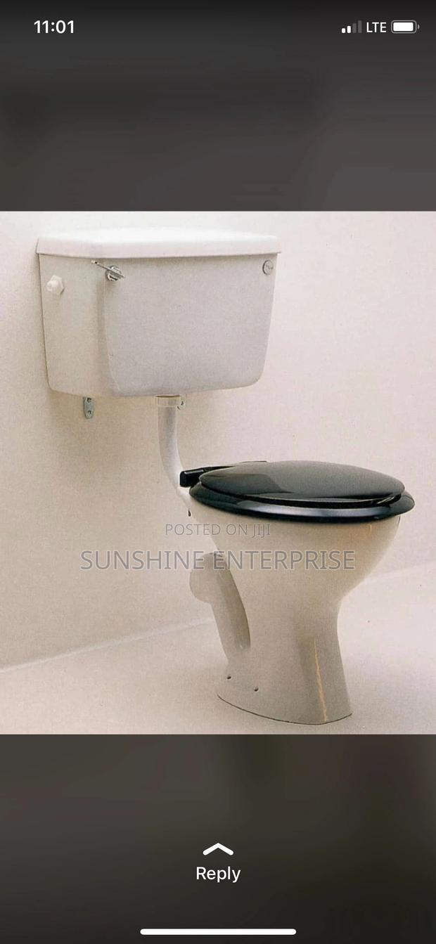 Side Flush Water Closet · Photo 1