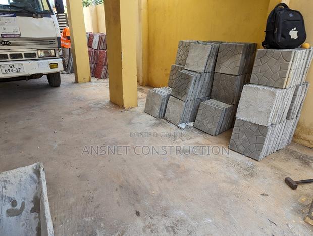 Pavement Tiles and Slabs Installation · Photo 1