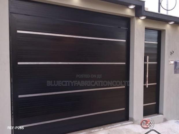 Black and White Design Garage Doors and All White Available · Photo 1