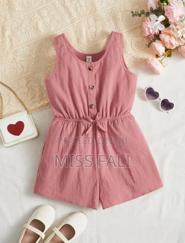 Tween Girl Button Front Bow Front Romper. 10years · Photo 1