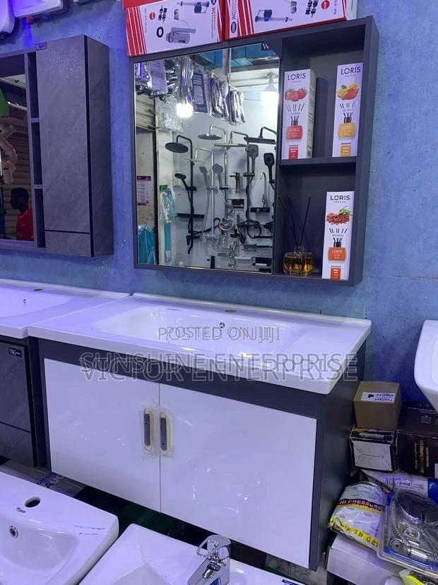 Solid Wash Hand Cabinet Basin With Cabinet Mirror · Photo 1