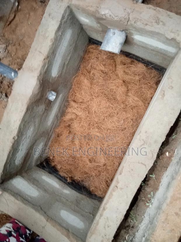Coconut Fiber/ Biodigester Toilet Construction · Photo 1