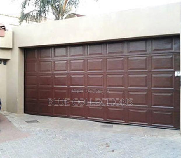 Quality Automated Garage Door · Photo 1