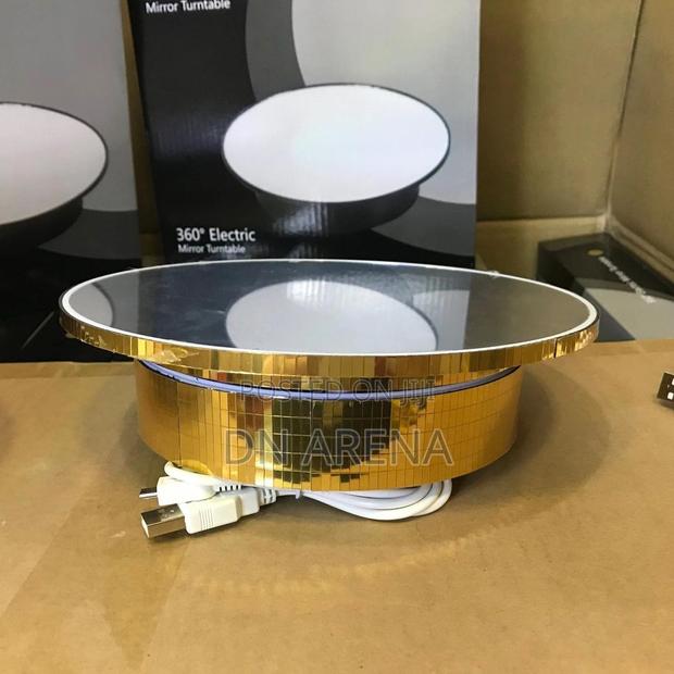 Luxury Gold Rotating Stand Weve in Acrylic Mirror · Photo 1