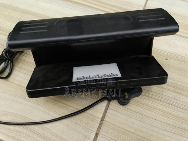 Counterfeit Detector · Photo 2