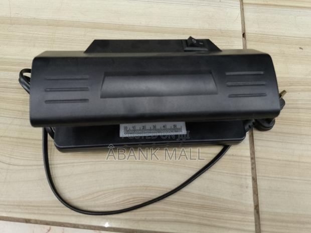 Counterfeit Detector · Photo 3