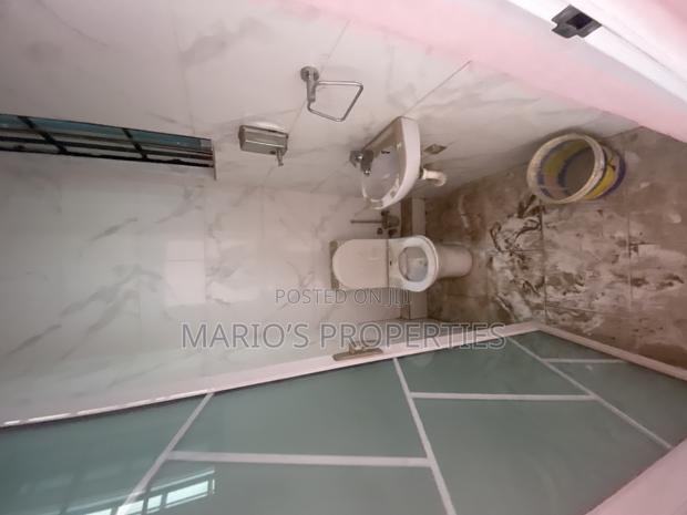 Single Shop for Rent at East Legon American House · Photo 6