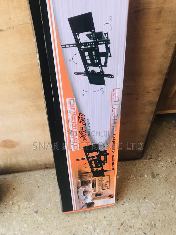Qualified Flat-Screen Adjustable TV Wall Mount · Photo 1