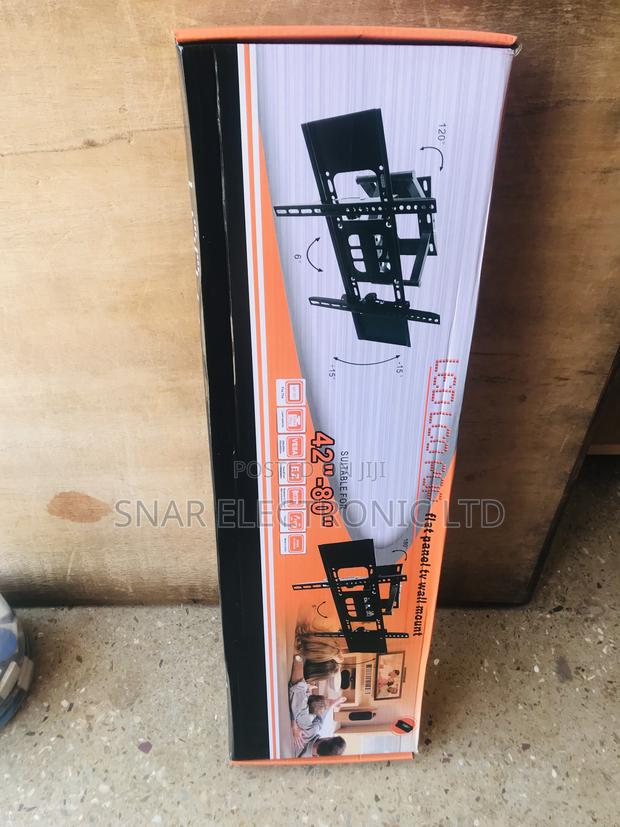 Efficient Flat-Screen Adjustable TV Wall Mount · Photo 1
