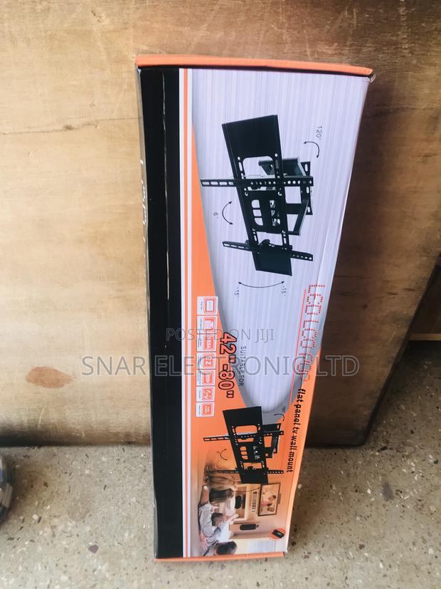 Efficiency Flat-Screen Adjustable TV Wall Mount · Photo 1