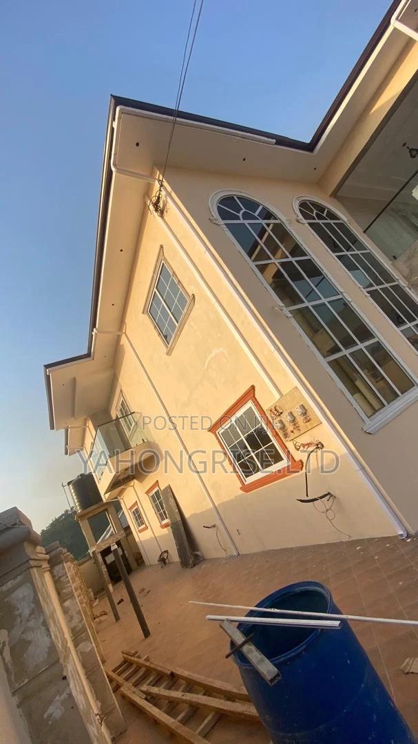 PVC White and Black Rain Gutter and Downspout · Photo 1