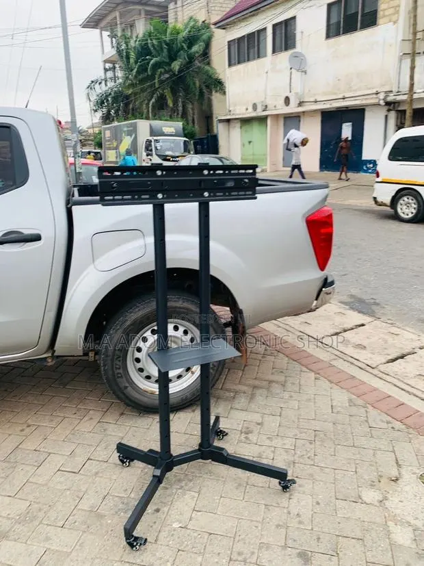 Latest and Affordable Mobile Tv Stand With Wheels for 32”-70 · Photo 1
