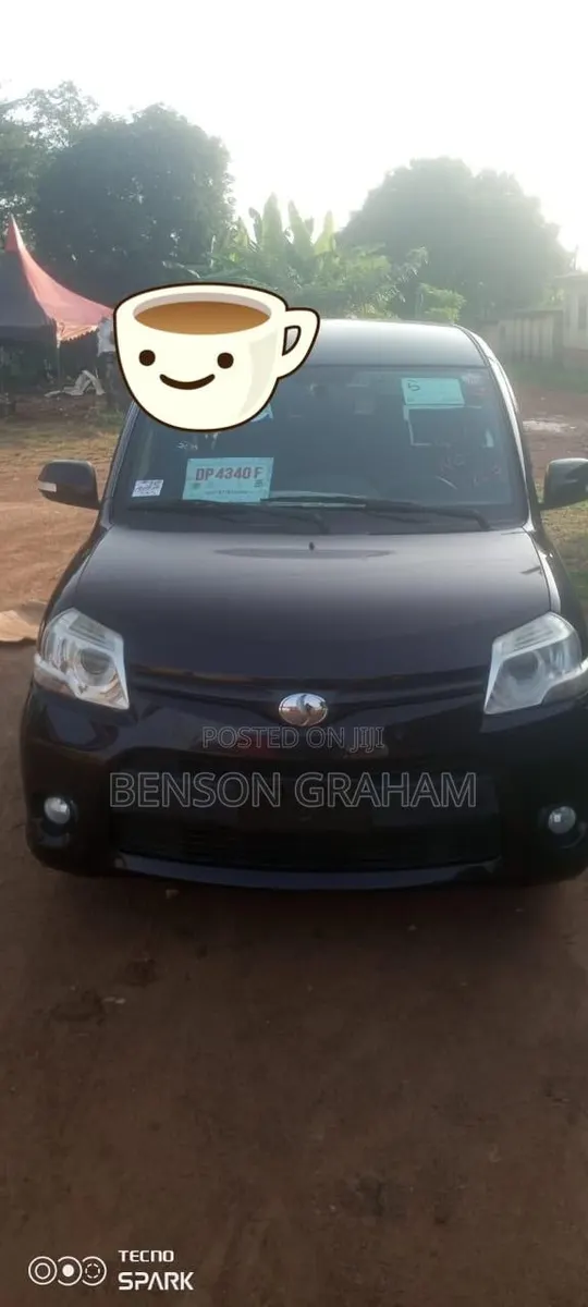 Toyota Sienta 1.5 AWD 2014 Maroon · Photo 1