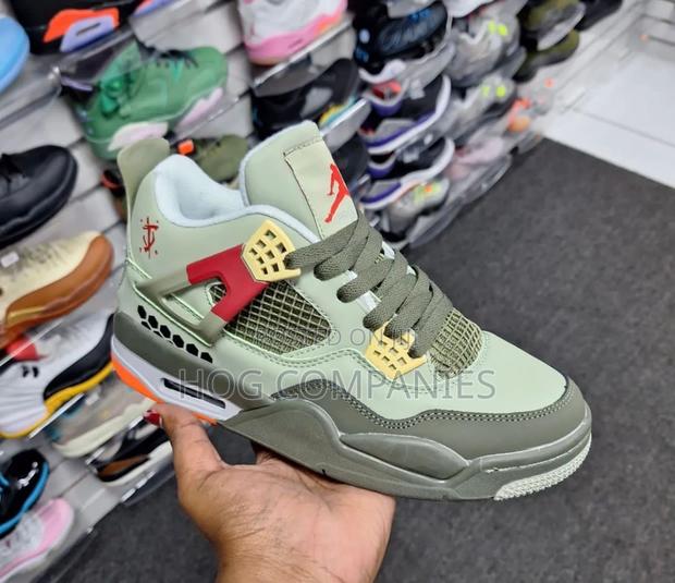 Air Jordan 4 Sneakers Shoe Kick · Photo 1
