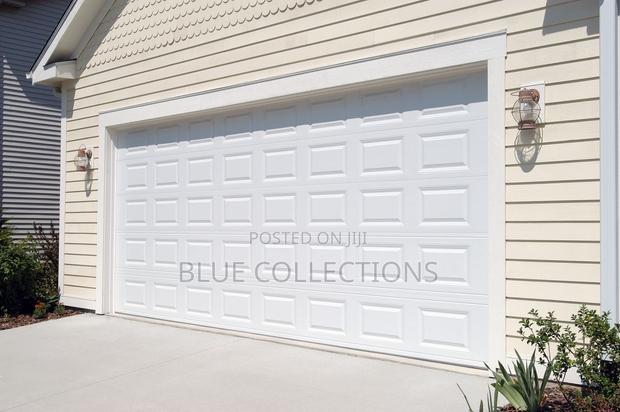 Canada Automated Garage Door With Remote · Photo 1