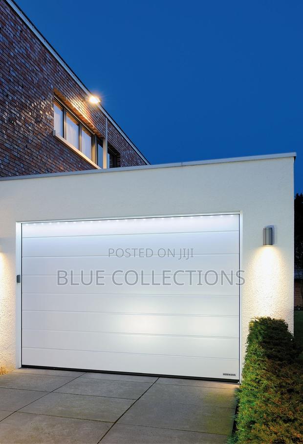 Morden Remote Garage Door · Photo 1