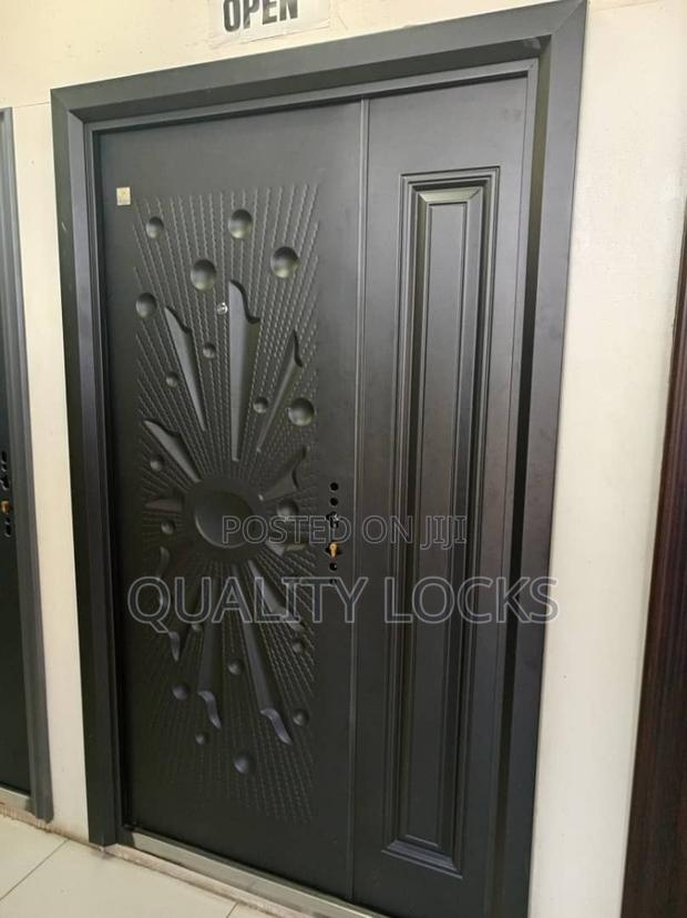 New Black Metal Security Door · Photo 1