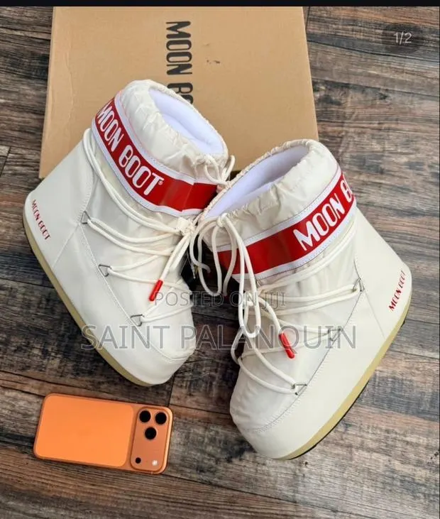 White Moon Boot Snow Boots a Bold Red Logo Strap Acros · Photo 1