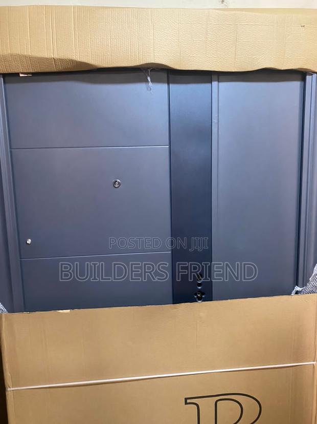 Gray Standard One Half Steel Security Door Complete · Photo 1
